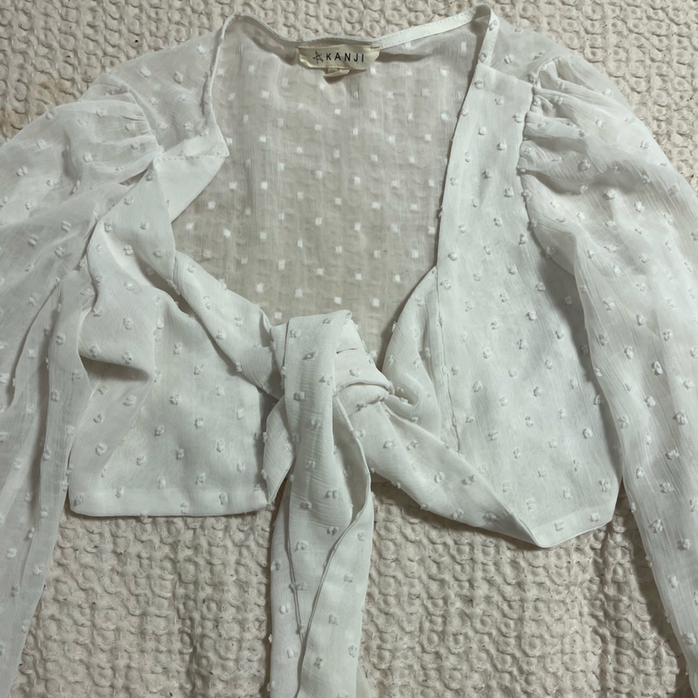 White akanji small shrug